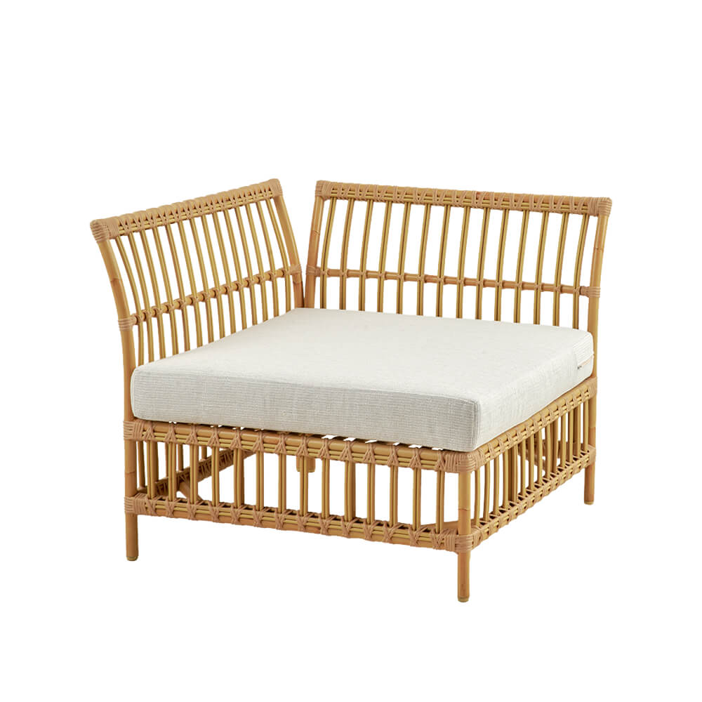 Panca d'angolo da giardino in rattan con cuscino bianco comodo