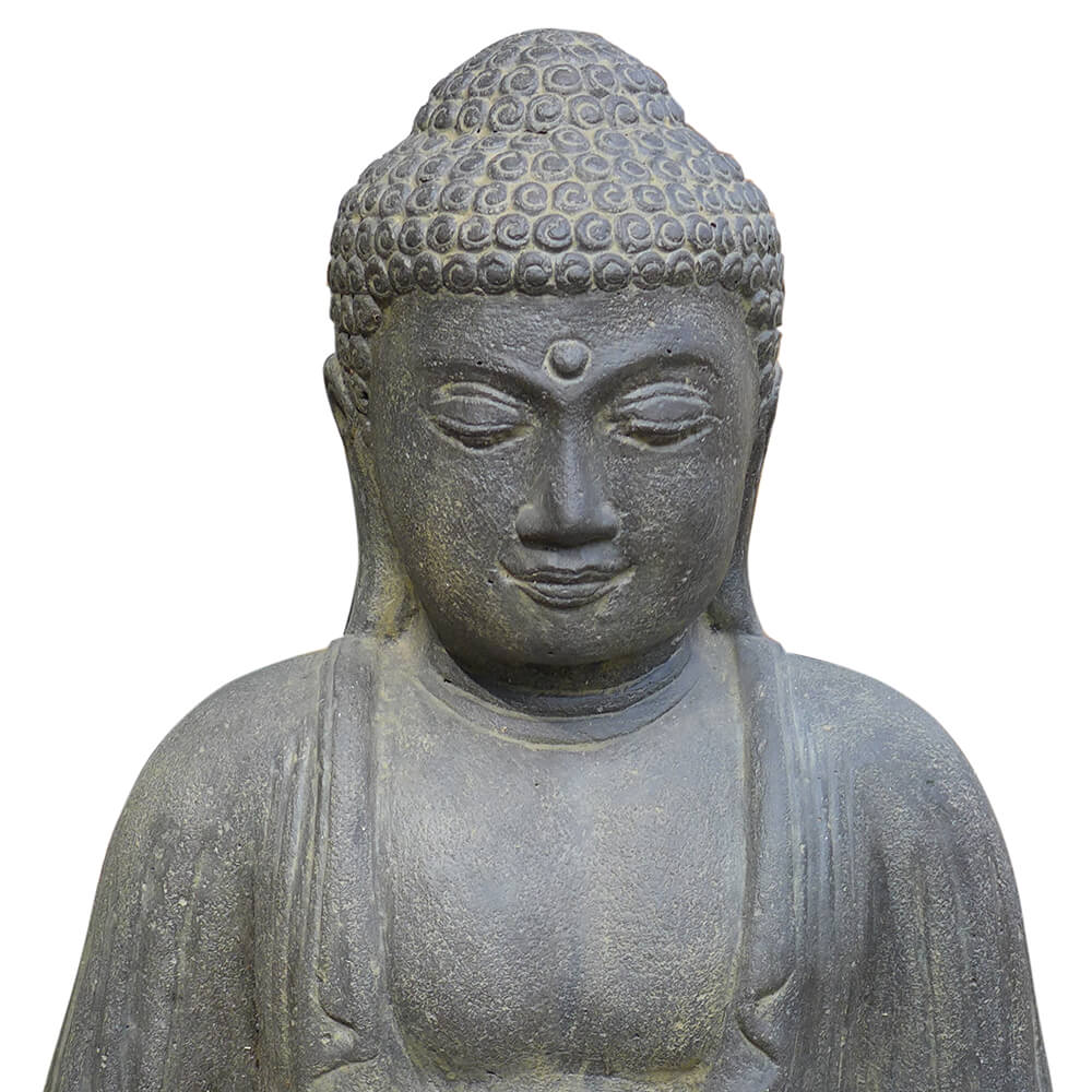 Photo en gros plan d'une statue de Bouddha en pierre pour décoration de jardin