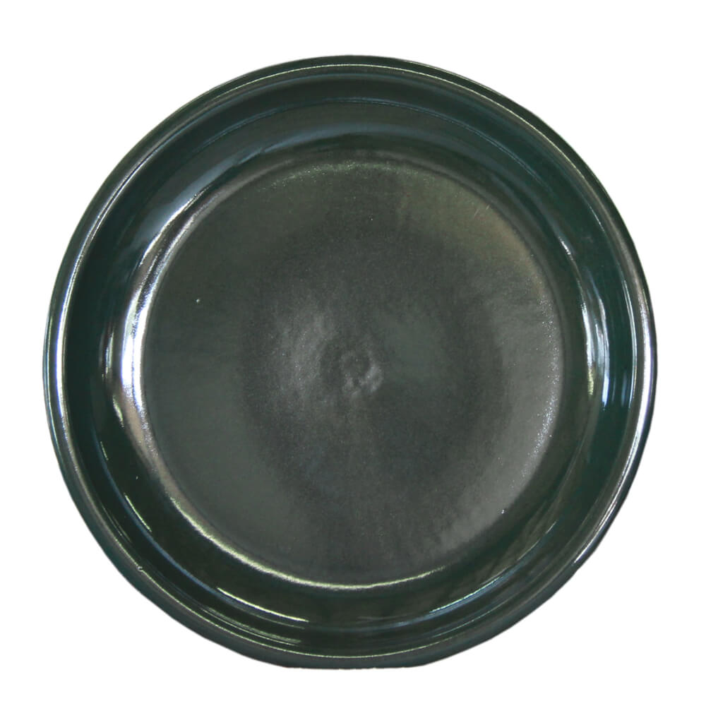 Assiette ronde en verre vert foncé, parfaite pour les tables de jardin exclusives