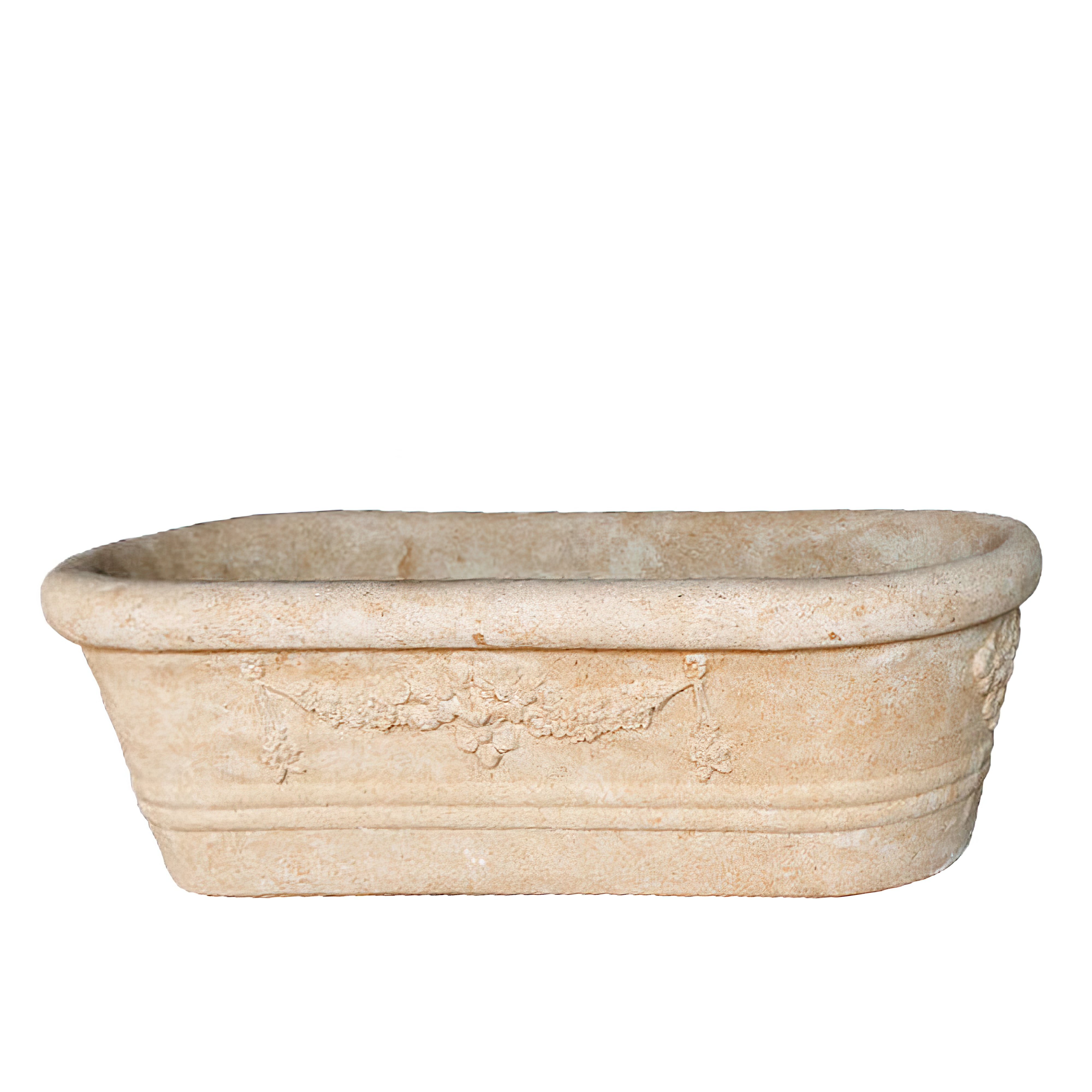 Fioriera rettangolare beige in pietra con motivo floreale decorativo e aspetto rustico