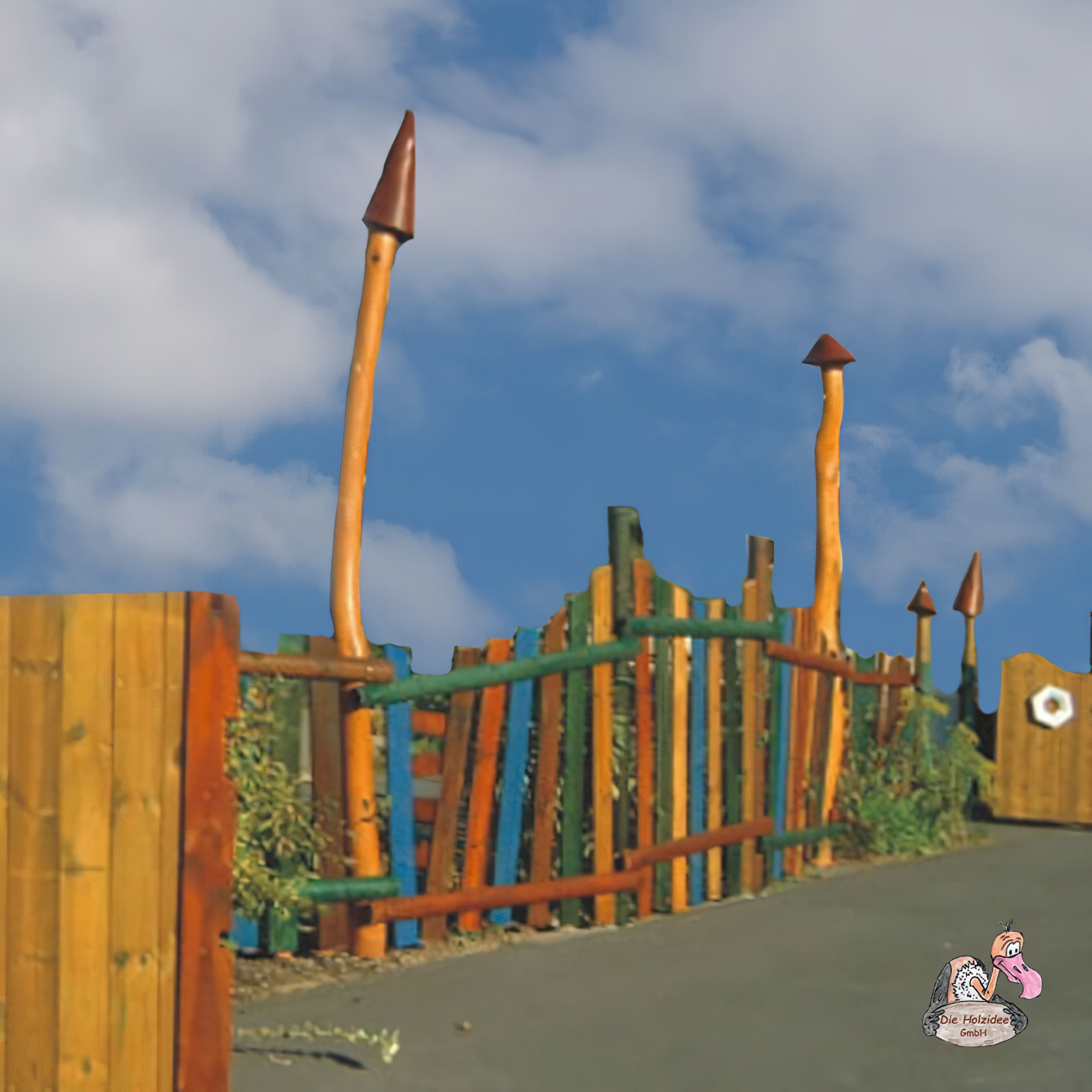 Farbiger Lattenzaun aus Eichen- und Robinienholz - Zaun Kunterbunt