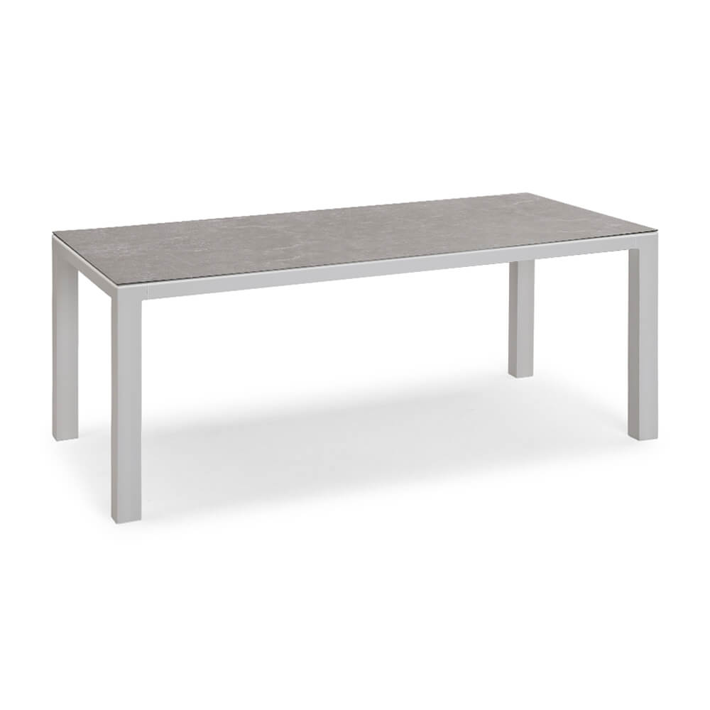 Rechteckiger Gartentisch mit grauem Steinplatte und silbernem Aluminiumgestell