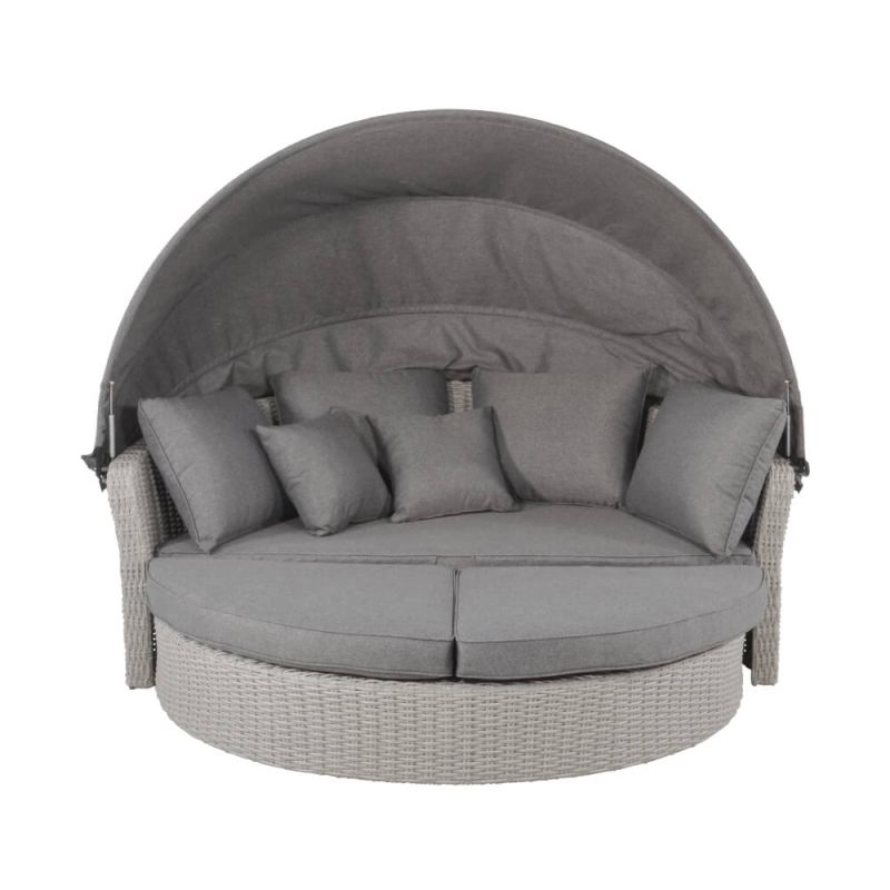 Lit de jardin rond confortable en osier gris avec auvent et plusieurs coussins gris