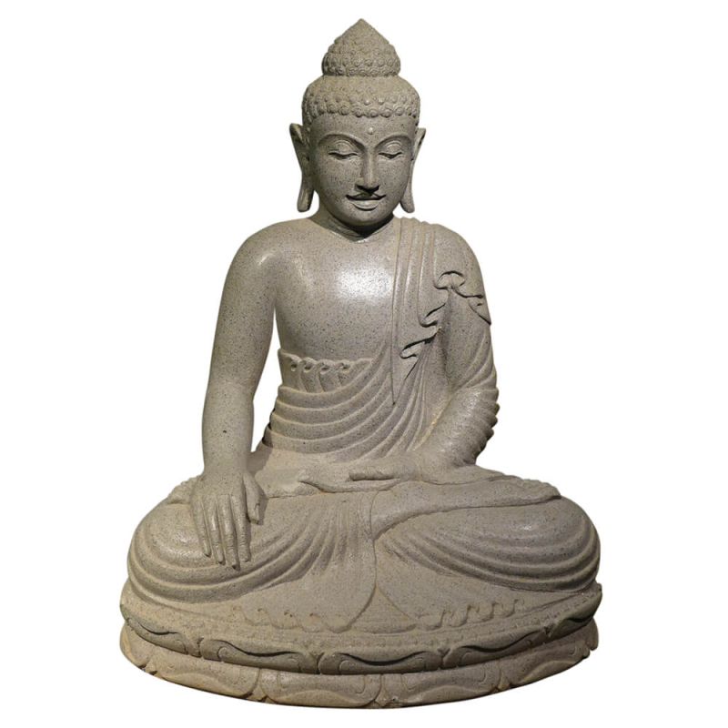 Statua di Buddha in pietra seduto in meditazione come decorazione da giardino