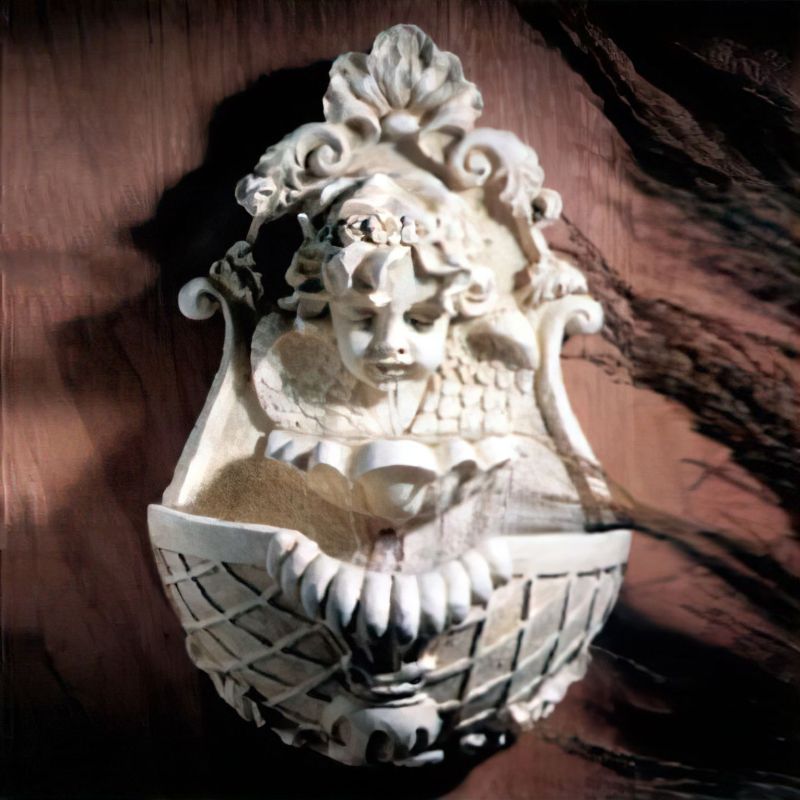 Fontaine murale blanche avec tête d'ange et oiseau, décoration de jardin élégante