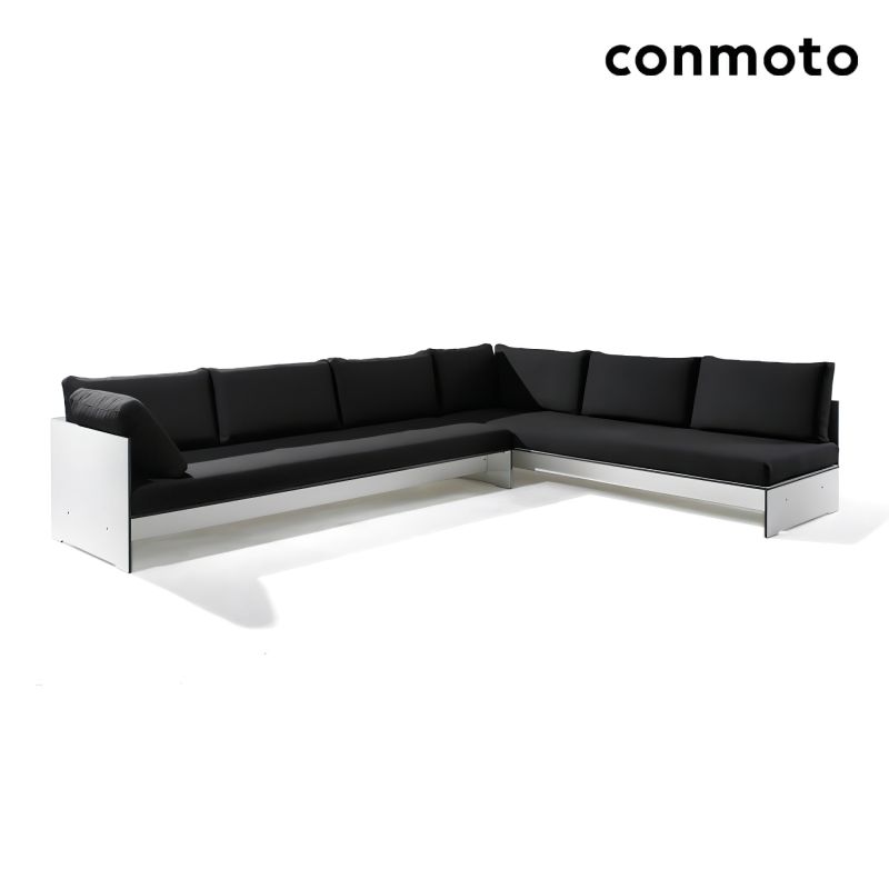 Salotto ad angolo da giardino bianco con cuscini neri per seduta e schienale, design moderno
