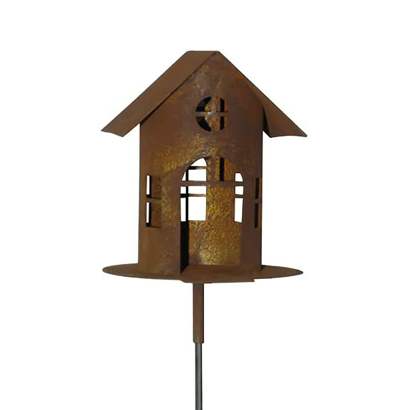 Maison de jardin en métal rouillé sur tige comme décoration de jardin