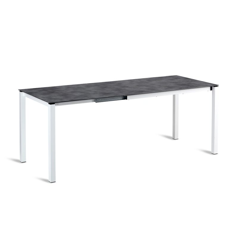 Table de jardin moderne avec pieds métalliques et surface de table foncée