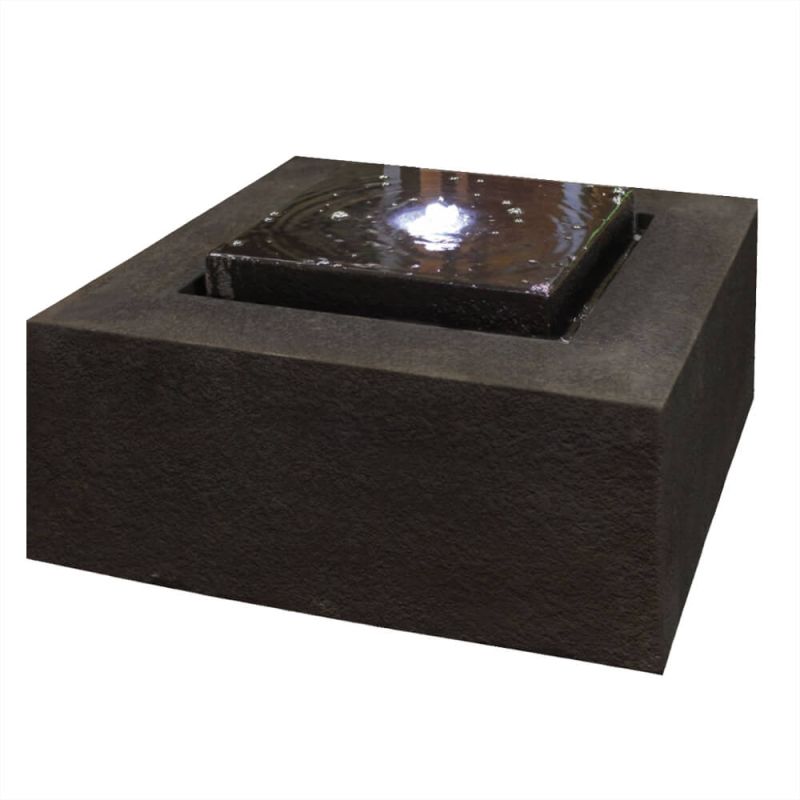 Fontana da giardino moderna nera in pietra con forma quadrata e acqua che scorre