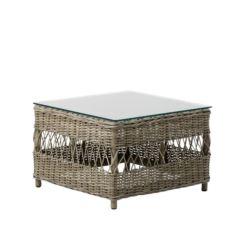 Table de jardin carrée en rotin avec surface en verre sur fond blanc